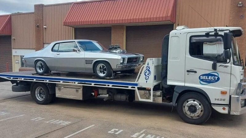 A Shelby Mustang being towed