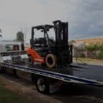 A forklift being transported