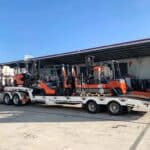 Forklifts being transported