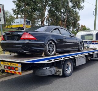 Mercedes CL 65 AMG being towed on a flat bed tow truck from Melbourne