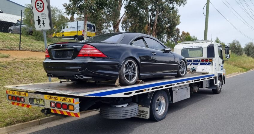 Mercedes CL 65 AMG being towed on a flat bed tow truck from Melbourne