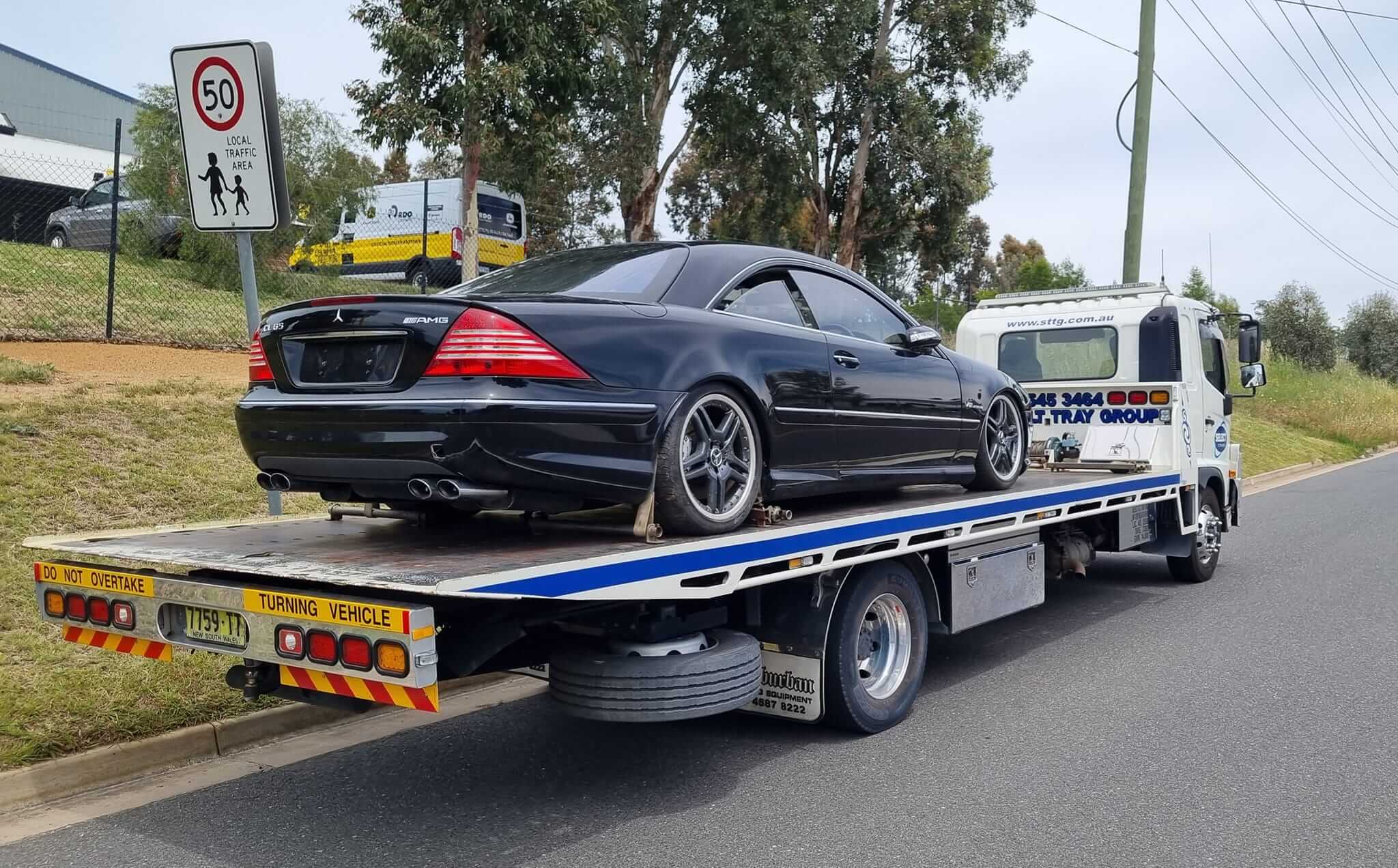 Mercedes CL 65 AMG being towed on a flat bed tow truck from Melbourne