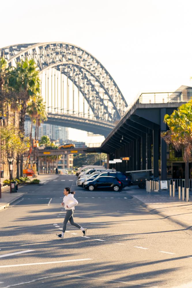 Street view of Sydney CBD with the Harbour Bridge in the background